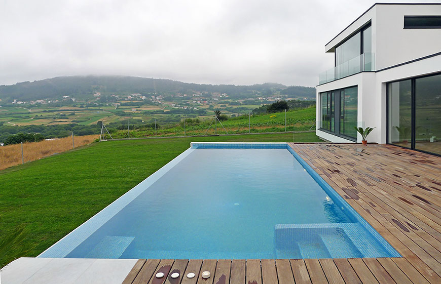 Piscina desbordante vivienda Chaamín